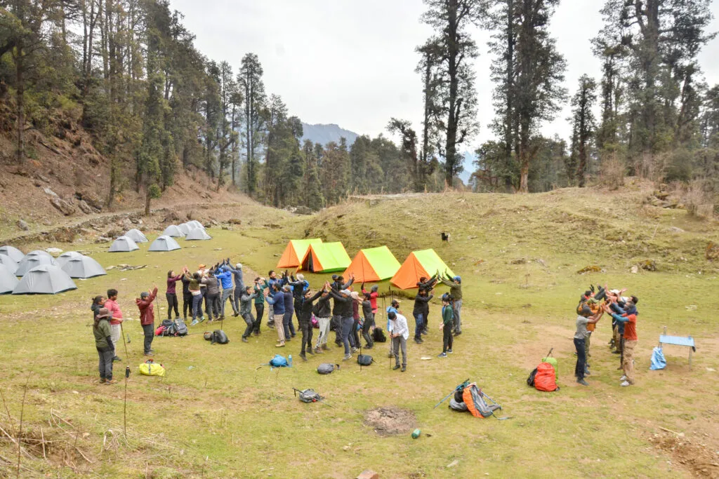 Laughter and chatter fill the air as ISB students settle into their campsite.