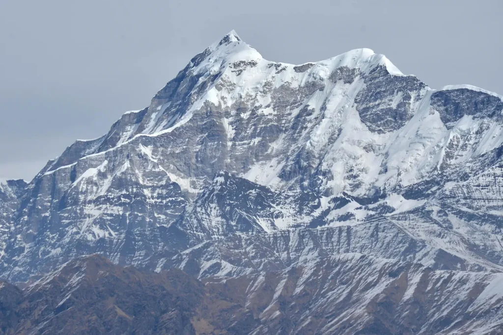 Breath-taking sight of towering Mt. Trishul exhibiting its grandeur.