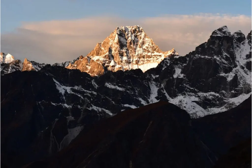 A sunlit mountain on the Everest Base Camp Trek.