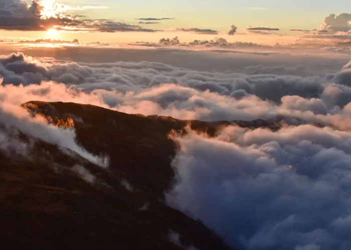 A vast expanse of floating clouds creates a captivating sight on Khopra Ridge trek.