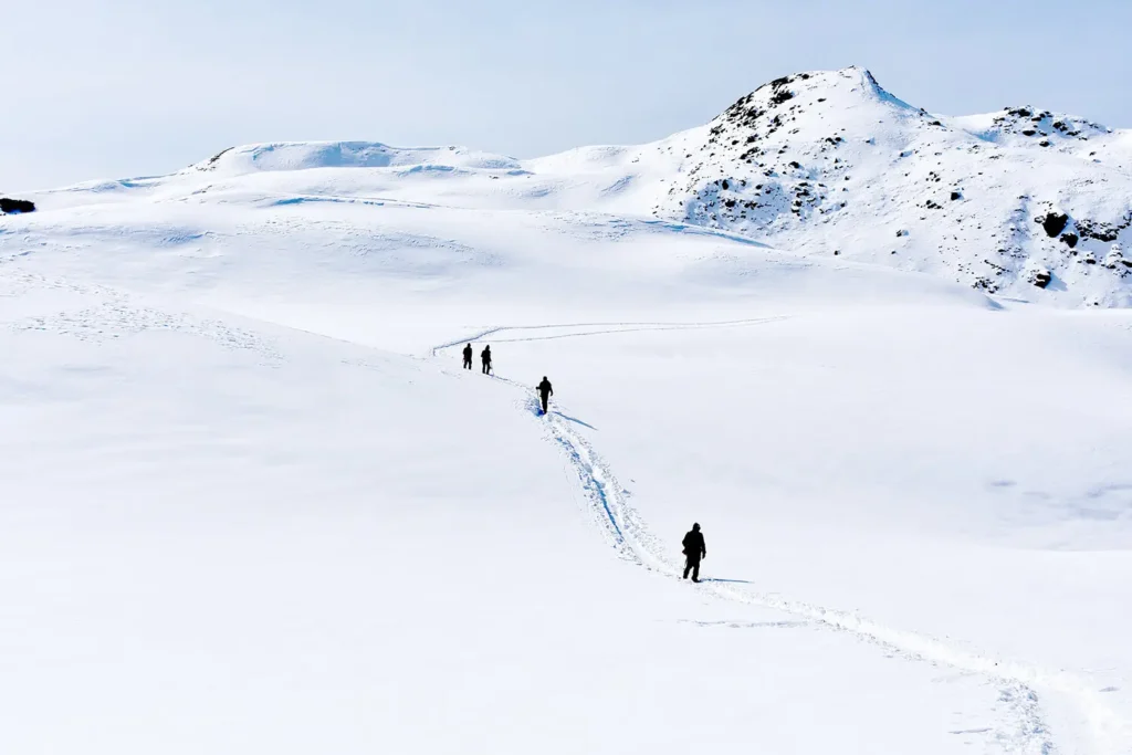 Trekkers enjoy the winter wonderland on Dodital Darwa Trek.