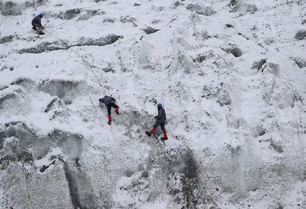 Advance Mountaineering Course trainee traverse an ice wall as a part of Ice Craft training. 